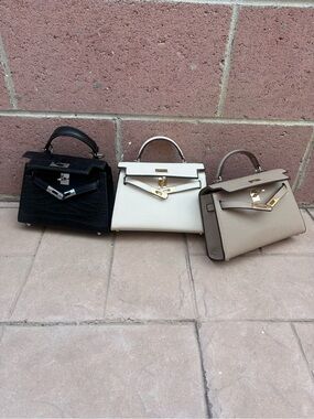French design Mini bags with crossbody strap.